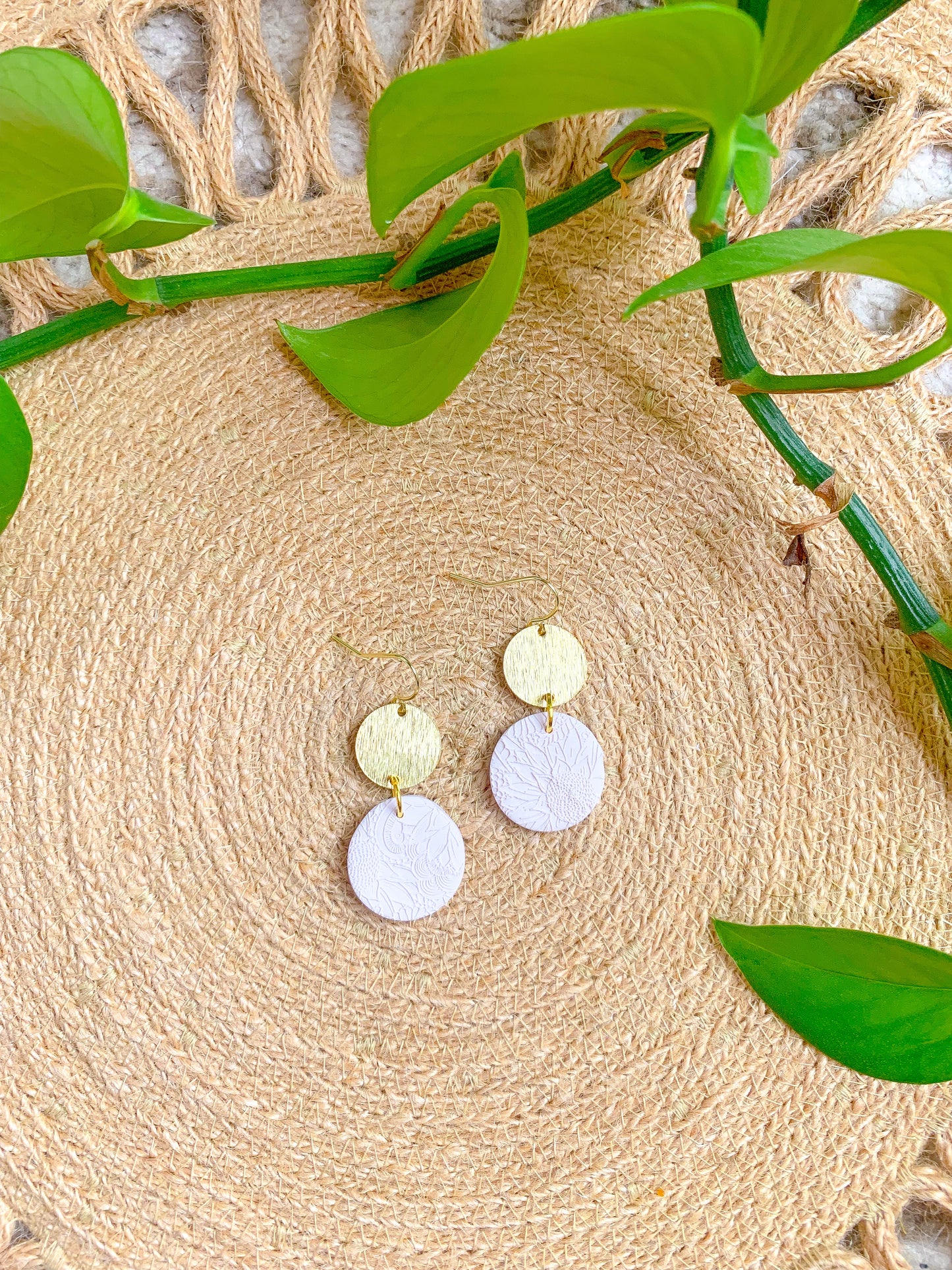 Flower imprinted white dangles