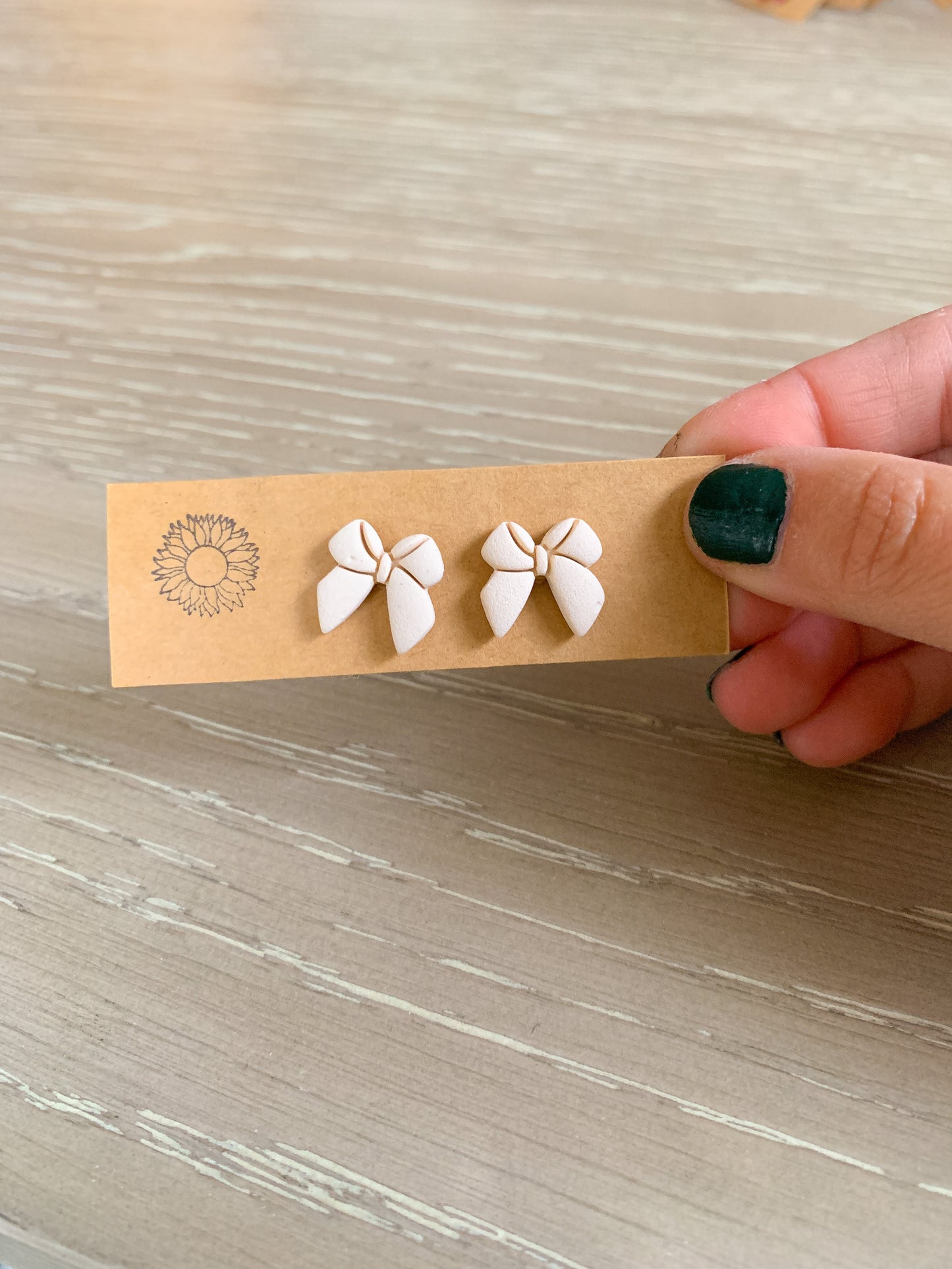 Cream Bow Studs